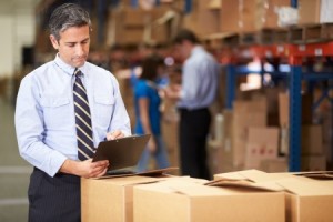 Manager-In-Warehouse-Checking-Boxes